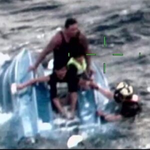 Dad and His Sons Get Rescued After Their Boat Capsizes